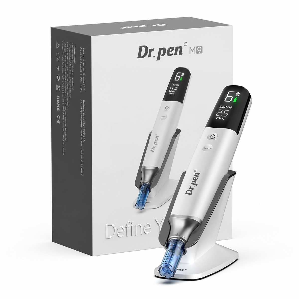 Dr. Pen M9 blanc sur son support à côté de sa boîte d’origine
